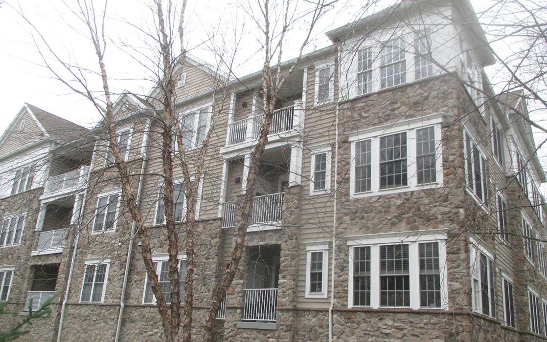 Typical three-story rear of garden homes at Reserve at Gwynedd in Upper Gwynedd, Pennsylvania. 