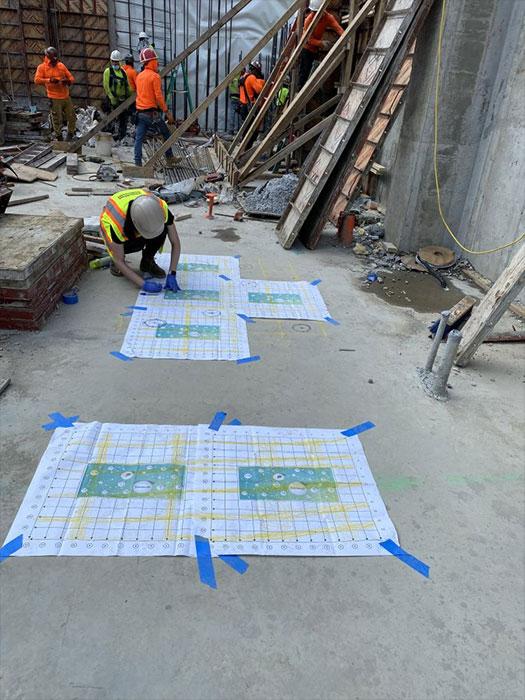 Marking core locations on the mat foundation using GPR area scans. 